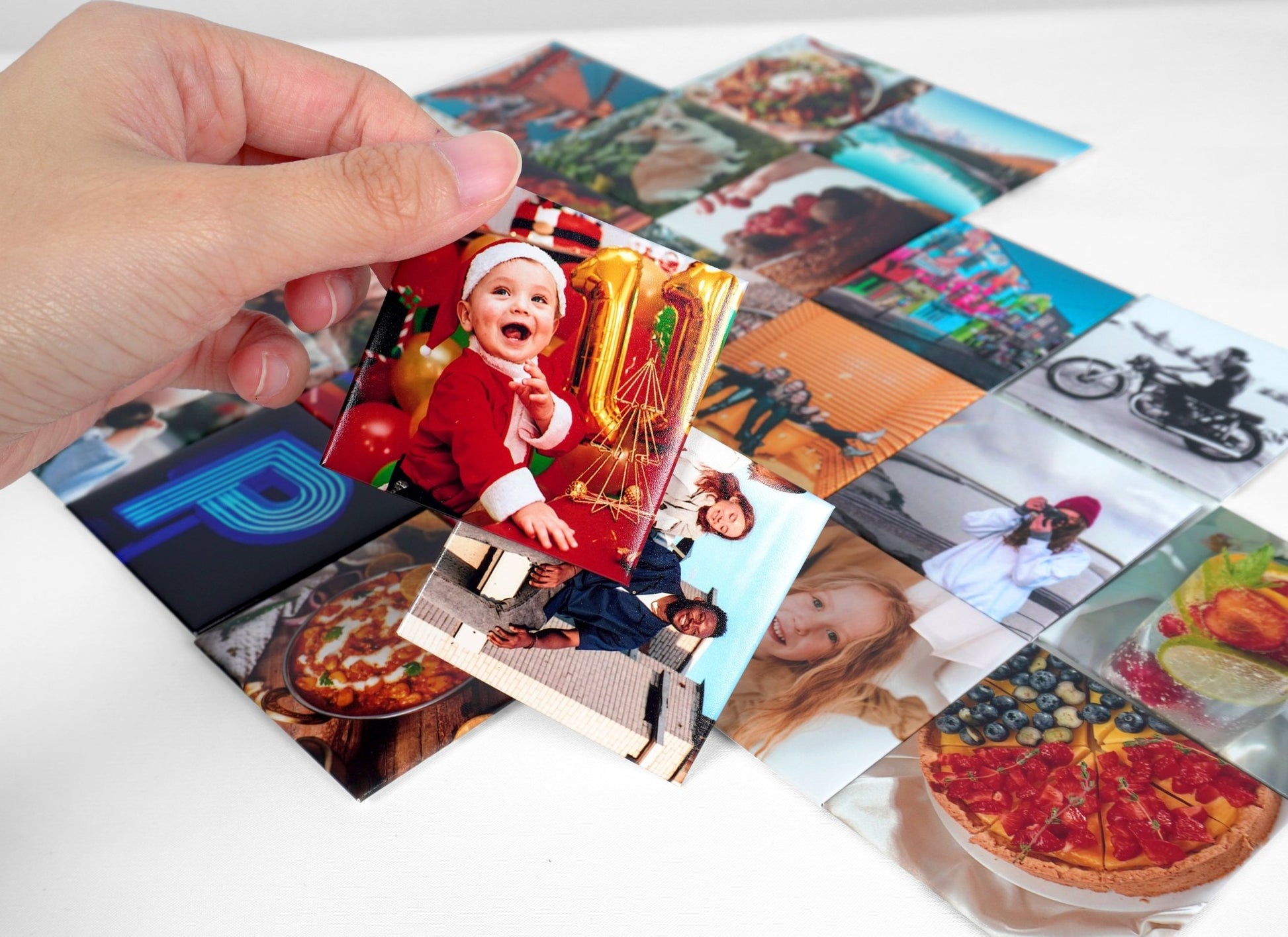 Square photo magnet - Lalapic | A hand holding a cute square photo magnet feature a photo of a kid wearing Christmas costumes.